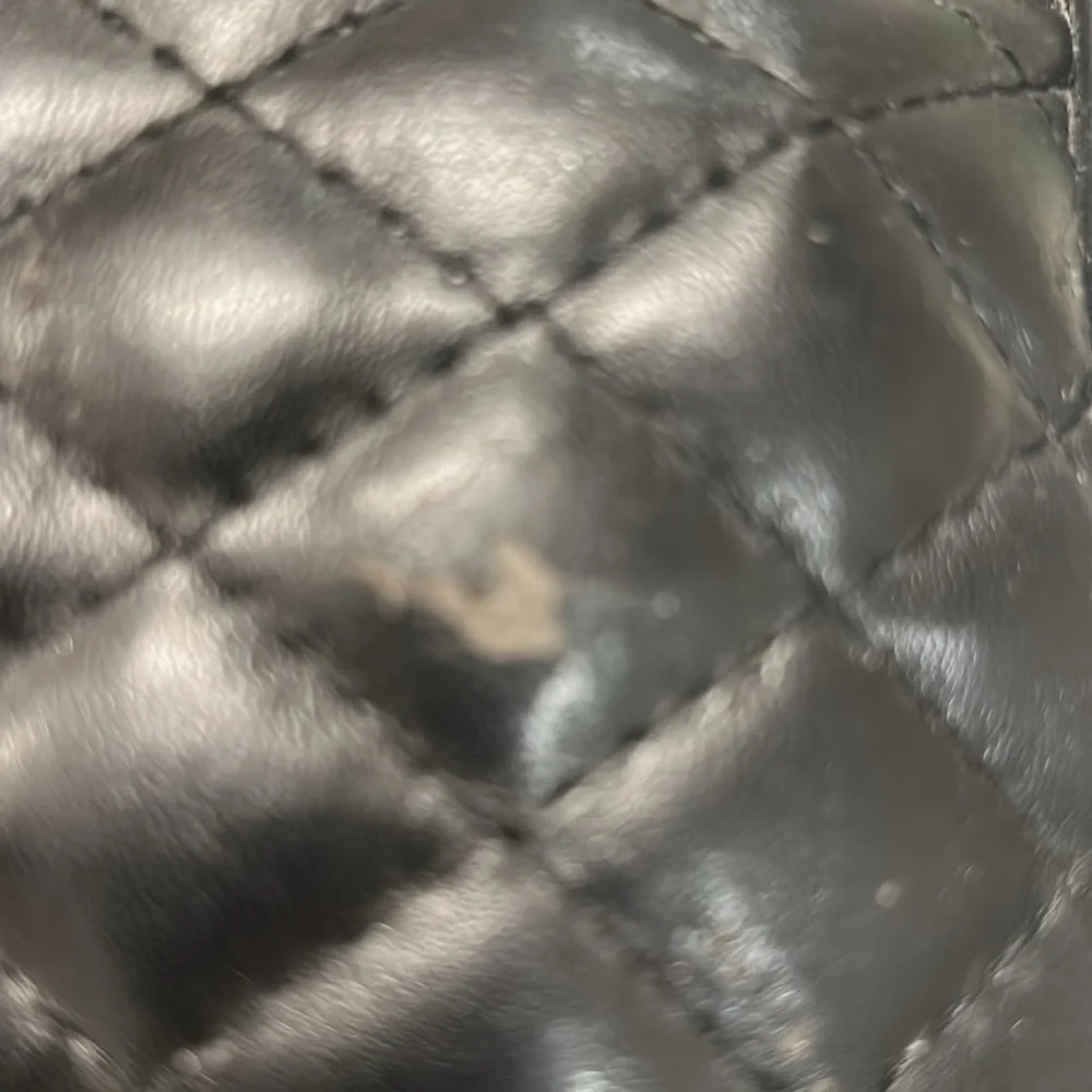 T3 branded quilted